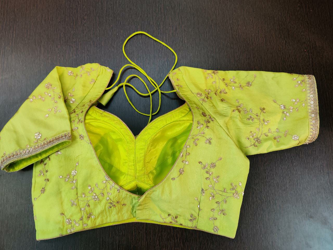 Buy stunning lemon green embroidered sari blouse online in USA with lace. Elevate your Indian saree style with exquisite readymade saree blouse, embroidered saree blouses, Benarasi sari blouse, designer saree blouse from Pure Elegance Indian clothing store in USA.-back