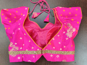 Buy bright pink Bandhej print saree blouse online in USA with zari buta. Elevate your Indian saree style with exquisite readymade sari blouse, embroidered saree blouses, Benarasi sari blouse, designer saree blouse from Pure Elegance Indian clothing store in USA.-back
