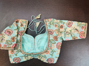 Buy gorgeous mint green embroidered Banarasi sari blouse online in USA. Elevate your Indian saree style with exquisite readymade sari blouse, embroidered saree blouses, Banarasi sari blouse, designer saree blouse from Pure Elegance Indian clothing store in USA.-back
