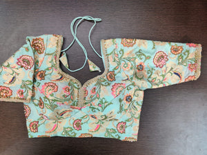 Buy gorgeous mint green embroidered Banarasi sari blouse online in USA. Elevate your Indian saree style with exquisite readymade sari blouse, embroidered saree blouses, Banarasi sari blouse, designer saree blouse from Pure Elegance Indian clothing store in USA.-front