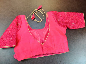 Buy stunning pink embroidered faux wrap saree blouse online in USA. Elevate your Indian saree style with exquisite readymade sari blouse, embroidered saree blouses, Banarasi sari blouse, designer sari blouse from Pure Elegance Indian clothing store in USA.-back