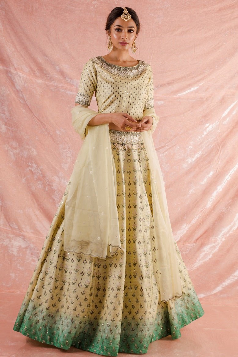 Buy beautiful off-white embroidered silk lehenga online in USA. Lehenga has fine simple yet heavy  embroidery work specially around the neck and has raglan sleeves. Be the talk of parties and weddings with exquisite designer lehengas from Pure Elegance Indian clothing store in USA.Shop online now.-full view