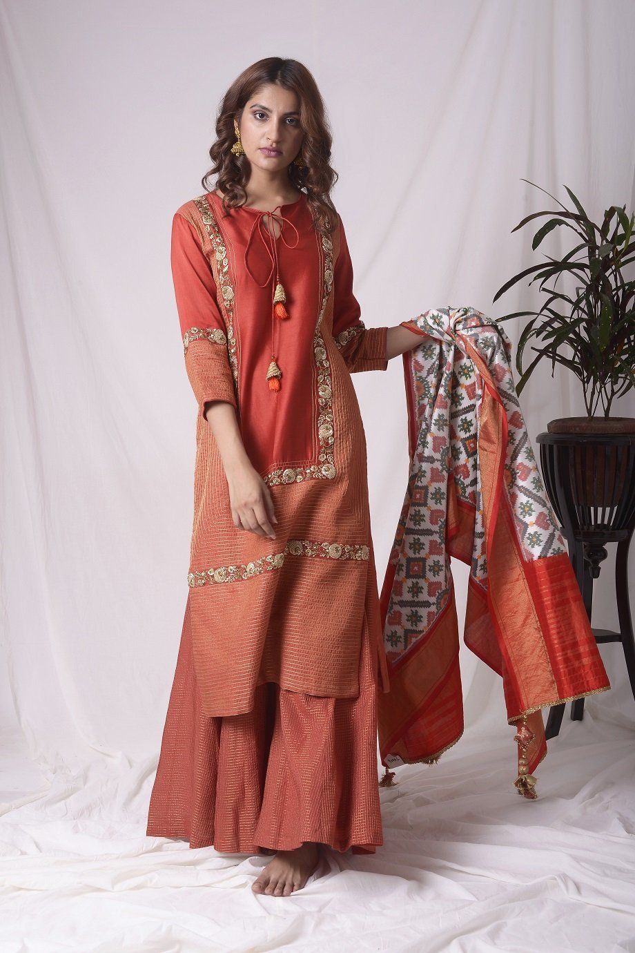 Buy red tissue chanderi suit online in USA with palazzo and dupatta. Be the talk of parties and weddings with exquisite designer gowns, Indian suits, Anarkali dresses, Indowestern dresses from Pure Elegance Indian clothing store in USA.Shop online now.-full view