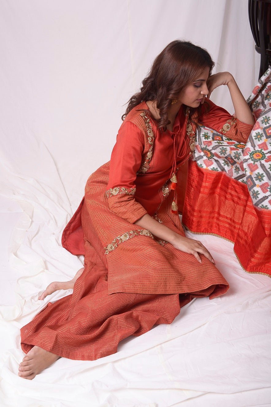 Buy red tissue chanderi suit online in USA with palazzo and dupatta. Be the talk of parties and weddings with exquisite designer gowns, Indian suits, Anarkali dresses, Indowestern dresses from Pure Elegance Indian clothing store in USA.Shop online now.-sitting