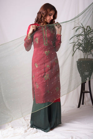 Buy red and green satin suit online in USA with palazzo and dupatta. Be the talk of parties and weddings with exquisite designer gowns, Indian suits, Anarkali dresses, Indowestern dresses from Pure Elegance Indian clothing store in USA.Shop online now.-side view-2
