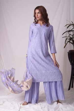 Buy blue chanderi suit online in USA with pearl work. Buy grey lucknowi suit online in USA with pearl work. Be the talk of parties and weddings with exquisite designer gowns, Indian suits, Anarkali dresses, Indo-western dresses from Pure Elegance Indian clothing store in USA .Shop online now.-front