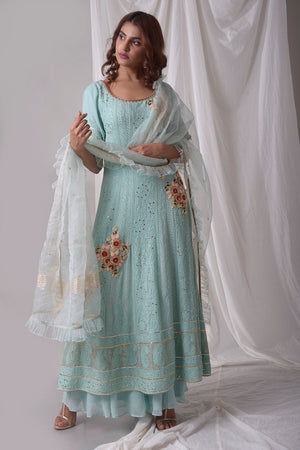 Buy aqua blue georgette suit online in USA with palazzo and dupatta. Be the talk of parties and weddings with exquisite designer gowns, Indian suits, Anarkali dresses, Indo-western dresses from Pure Elegance Indian clothing store in USA .Shop online now.-full view-8