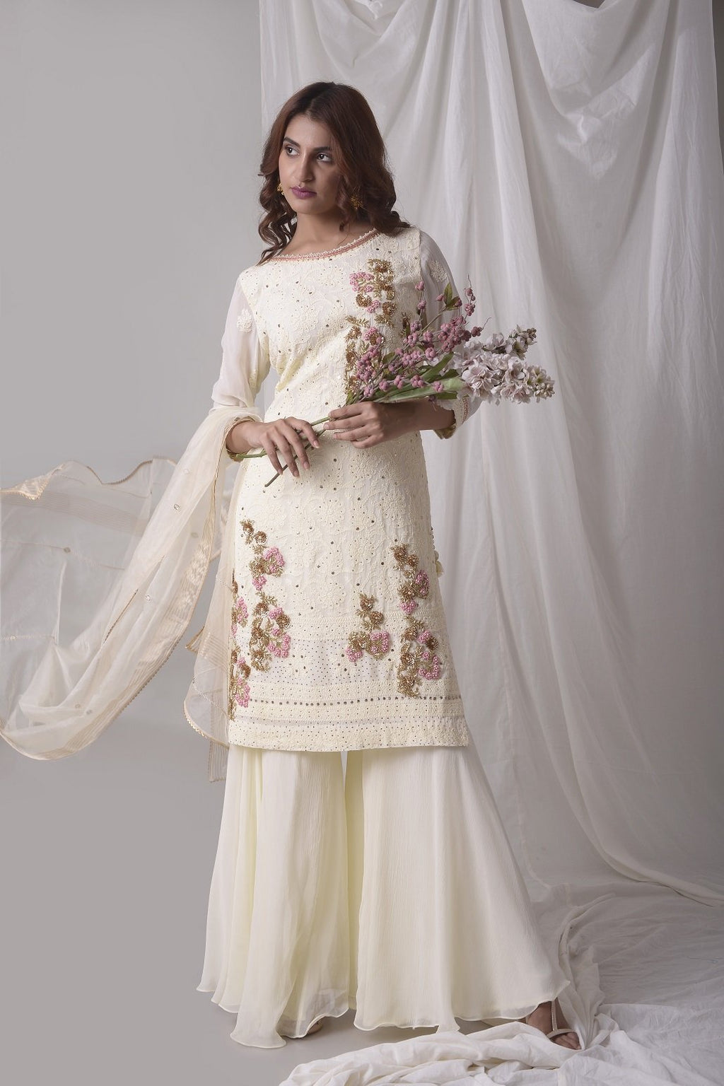 Buy offwhite georgette suit online in USA with palazzo and dupatta. Be the talk of parties and weddings with exquisite designer gowns, Indian suits, Anarkali dresses, Indo-western dresses from Pure Elegance Indian clothing store in USA .Shop online now.-fulll view