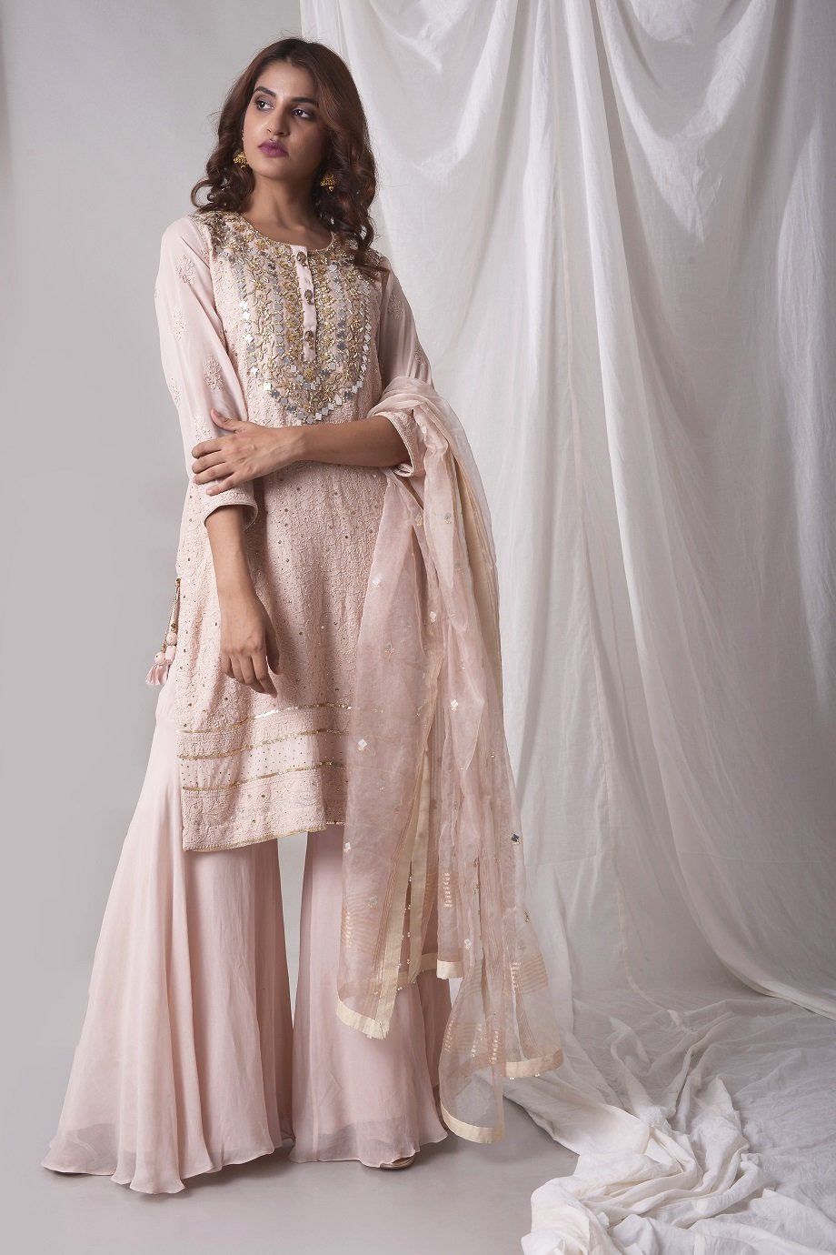 Buy powder pink georgette suit online in USA. Be the talk of parties and weddings with exquisite designer gowns, Indian suits, Anarkali dresses, Indo-western dresses from Pure Elegance Indian clothing store in USA .Shop online now.-full view