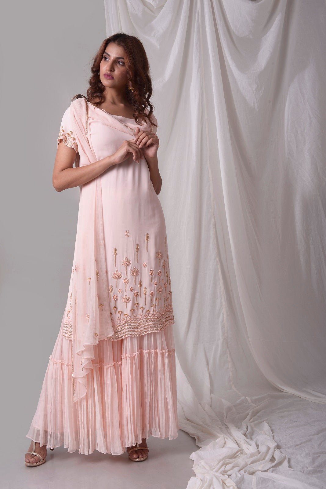 Buy pink georgette suit online in USA. Be the talk of parties and weddings with exquisite designer gowns, sharara suits, Anarkali suits, salwar suits from Pure Elegance Indian clothing store in USA. Shop online now.-full view-1