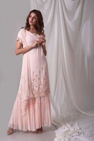 Buy pink georgette suit online in USA. Be the talk of parties and weddings with exquisite designer gowns, sharara suits, Anarkali suits, salwar suits from Pure Elegance Indian clothing store in USA. Shop online now.-full view-1