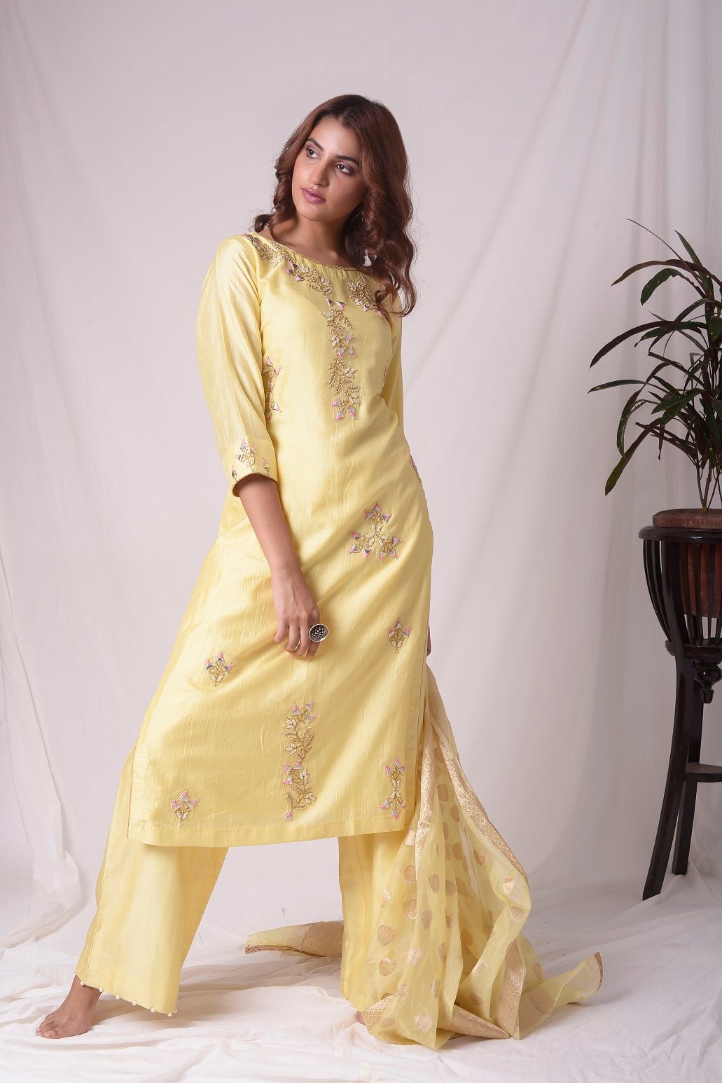 Buy yellow silk suit online in USA with kachi patti work. Be the talk of parties and weddings with exquisite designer gowns, sharara suits, Anarkali suits, salwar suits from Pure Elegance Indian clothing store in USA. Shop online now.-full view-2