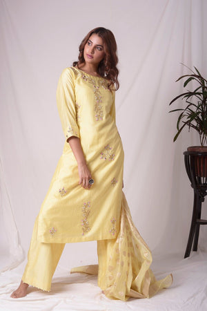 Buy yellow silk suit online in USA with kachi patti work. Be the talk of parties and weddings with exquisite designer gowns, sharara suits, Anarkali suits, salwar suits from Pure Elegance Indian clothing store in USA. Shop online now.-full view-2
