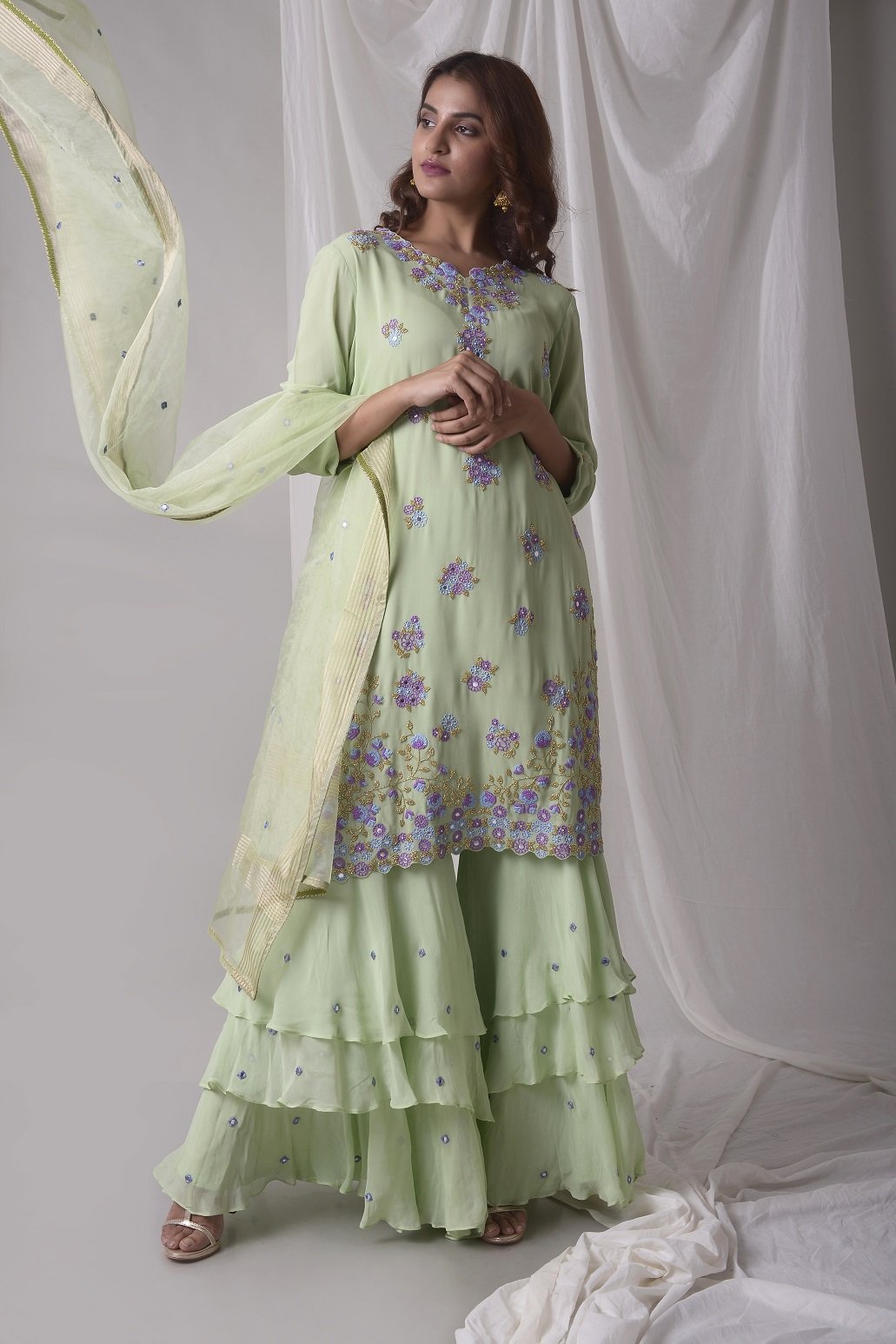 Buy dusty green georgette suit online in USA with palazzo and dupatta. Be the talk of parties and weddings with exquisite designer gowns, sharara suits, Anarkali suits, salwar suits from Pure Elegance Indian clothing store in USA. Shop online now..-full view