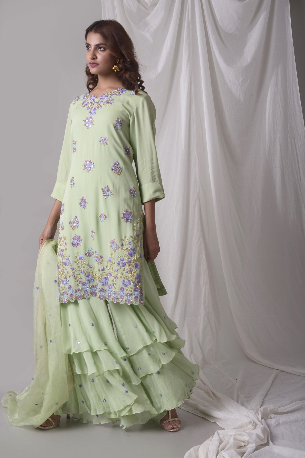Buy dusty green georgette suit online in USA with palazzo and dupatta. Be the talk of parties and weddings with exquisite designer gowns, sharara suits, Anarkali suits, salwar suits from Pure Elegance Indian clothing store in USA. Shop online now.-side view-2