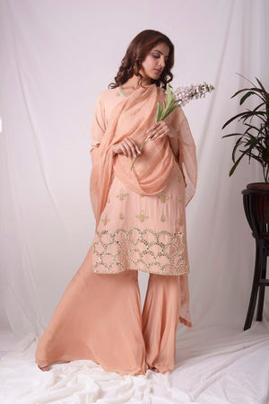 Buy peach orange georgette suit online in USA. Be the talk of parties and weddings with exquisite designer gowns, sharara suits, Anarkali suits, salwar suits from Pure Elegance Indian clothing store in USA. Shop online now.-full view-2