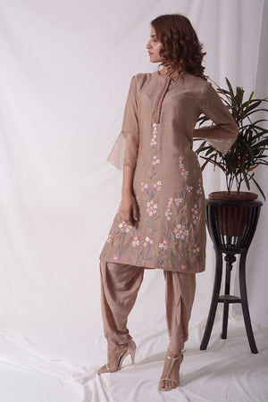 Buy beautiful brown cotton silk suit online in USA. Suit has simple multi color embroidery work. Kurta has 3/4 length sleeves which is net like at border, and dhoti. Simple look makes it elegant. Be the talk of parties and weddings with exquisite designer gowns from Pure Elegance Indian clothing store in USA.-side view-2