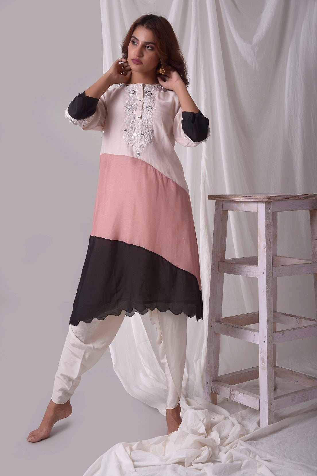 Buy off-white cotton silk suit online in USA. Suit has simple white work. Kurta has 3/4 length sleeves, white dhoti and its multi color with white, pink and black.Simple look makes it elegant. Be the talk of parties and weddings with exquisite designer gowns from Pure Elegance Indian clothing store in USA. Shop online now.-full view-2
