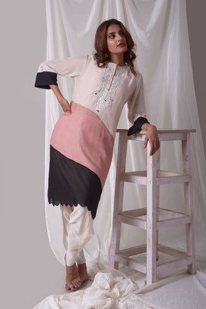 Buy off-white cotton silk suit online in USA. Suit has simple white work. Kurta has 3/4 length sleeves, white dhoti and its multi color with white, pink and black.Simple look makes it elegant. Be the talk of parties and weddings with exquisite designer gowns from Pure Elegance Indian clothing store in USA. Shop online now.-full view-3