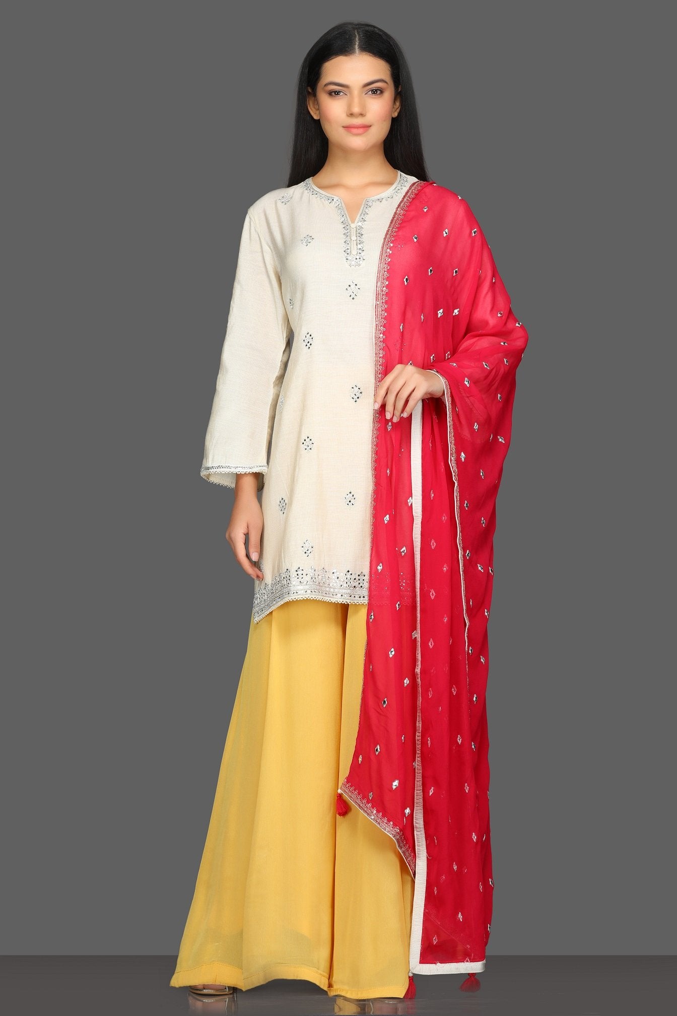 Buy lovely white and yellow embroidered sharara suit online in USA with red dupatta. Dazzle on weddings and special occasions with exquisite Indian designer dresses, sharara suits, Anarkali suits from Pure Elegance Indian fashion store in USA.-full view