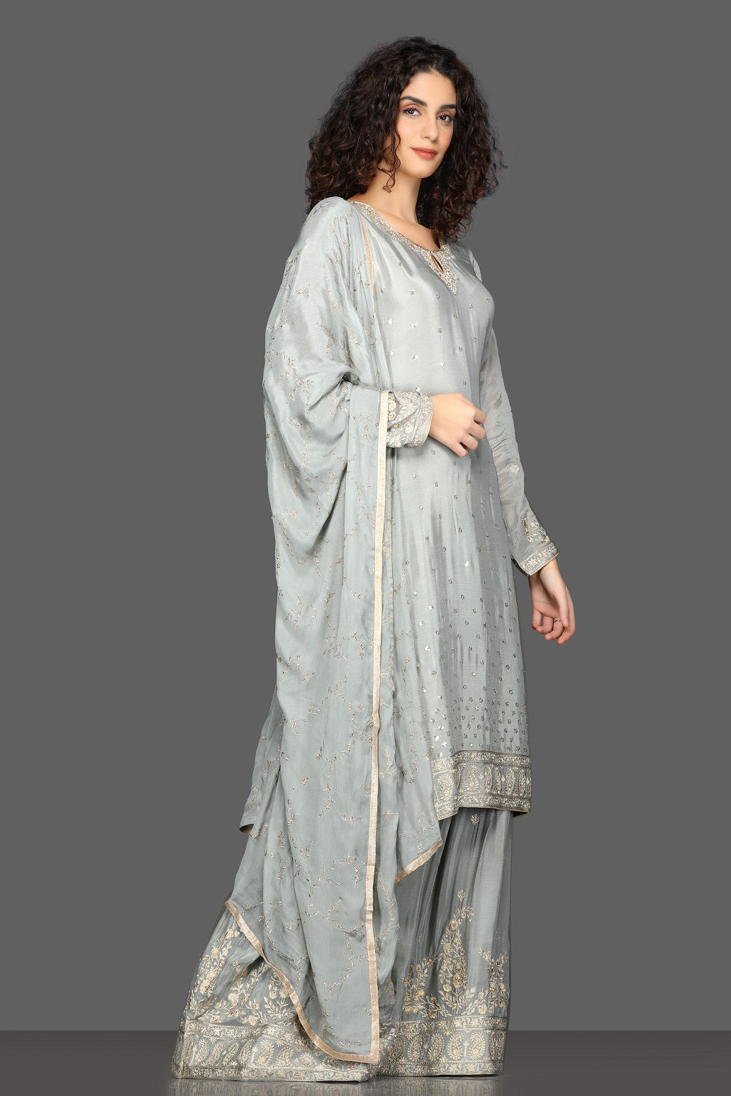 Buy stunning grey embroidered palazzo suit online in USA with matching dupatta. Dazzle on weddings and special occasions with exquisite Indian designer dresses, sharara suits, Anarkali suits from Pure Elegance Indian fashion store in USA.-side