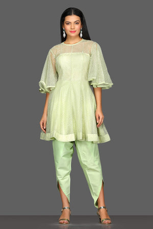 Buy stunning mint green designer suit online in USA with dhoti salwar and dupatta. Dazzle on weddings and special occasions with exquisite Indian designer dresses, sharara suits, Anarkali suits from Pure Elegance Indian fashion store in USA.-front