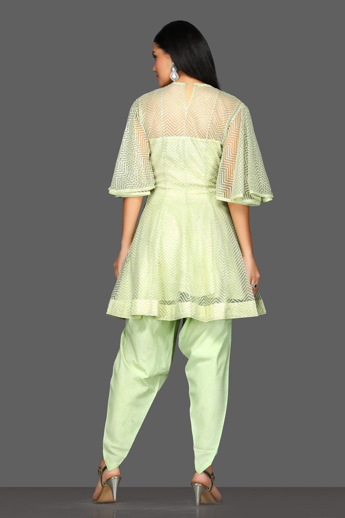 Buy stunning mint green designer suit online in USA with dhoti salwar and dupatta. Dazzle on weddings and special occasions with exquisite Indian designer dresses, sharara suits, Anarkali suits from Pure Elegance Indian fashion store in USA.-back