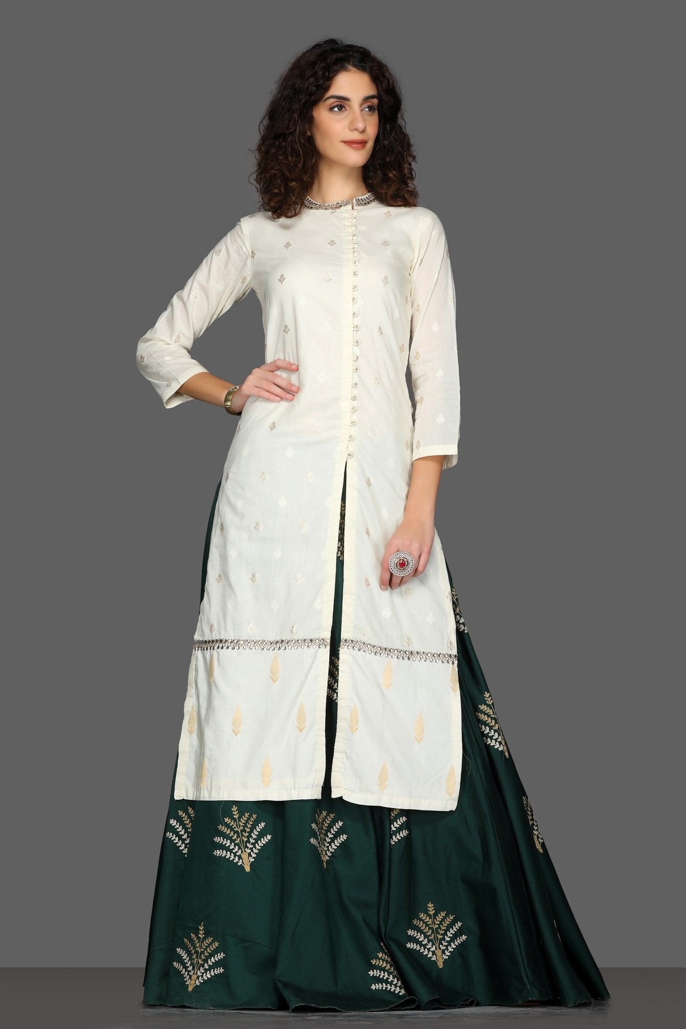 Buy elegant embroidered kurta with navy skirt online in USA and cream dupatta. Dazzle on weddings and special occasions with exquisite Indian designer lehengas, sharara suits, Anarkali suits from Pure Elegance Indian fashion store in USA.-right