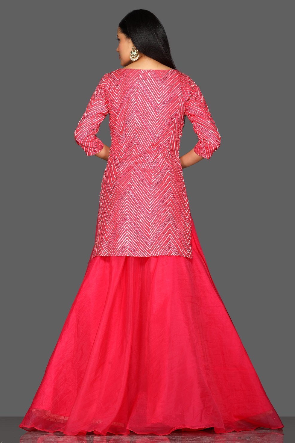 Shop pink embroidered skirt set online in USA with matching dupatta. Dazzle on weddings and special occasions with exquisite Indian designer dresses, sharara suits, Anarkali suits from Pure Elegance Indian fashion store in USA.-back