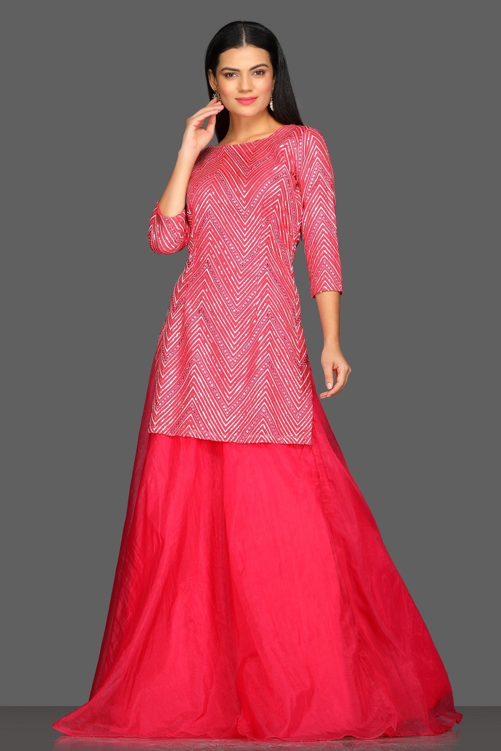 Shop pink embroidered skirt set online in USA with matching dupatta. Dazzle on weddings and special occasions with exquisite Indian designer dresses, sharara suits, Anarkali suits from Pure Elegance Indian fashion store in USA.-front
