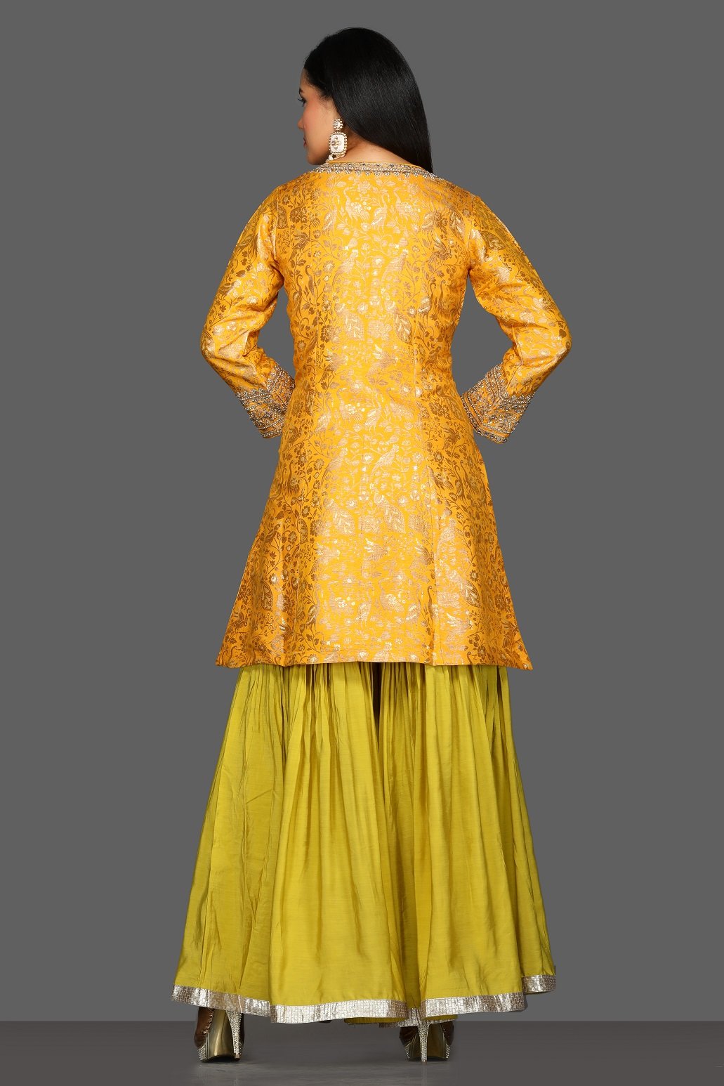 Buy yellow and green embroidered skirt set online in USA with pink dupatta. Dazzle on weddings and special occasions with exquisite Indian designer dresses, sharara suits, Anarkali suits from Pure Elegance Indian fashion store in USA.-back