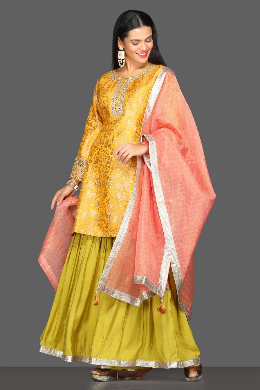 Buy yellow and green embroidered skirt set online in USA with pink dupatta. Dazzle on weddings and special occasions with exquisite Indian designer dresses, sharara suits, Anarkali suits from Pure Elegance Indian fashion store in USA.-full view