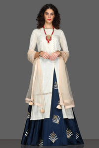 Buy elegant embroidered kurta with navy skirt online in USA and cream dupatta. Dazzle on weddings and special occasions with exquisite Indian designer lehengas, sharara suits, Anarkali suits from Pure Elegance Indian fashion store in USA.-front