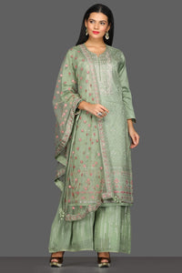 Buy beautiful pista green embroidered suit online in USA with palazzo and embroidered dupatta. Dazzle on weddings and special occasions with exquisite Indian designer lehengas, sharara suits, Anarkali suits from Pure Elegance Indian fashion store in USA.-full view