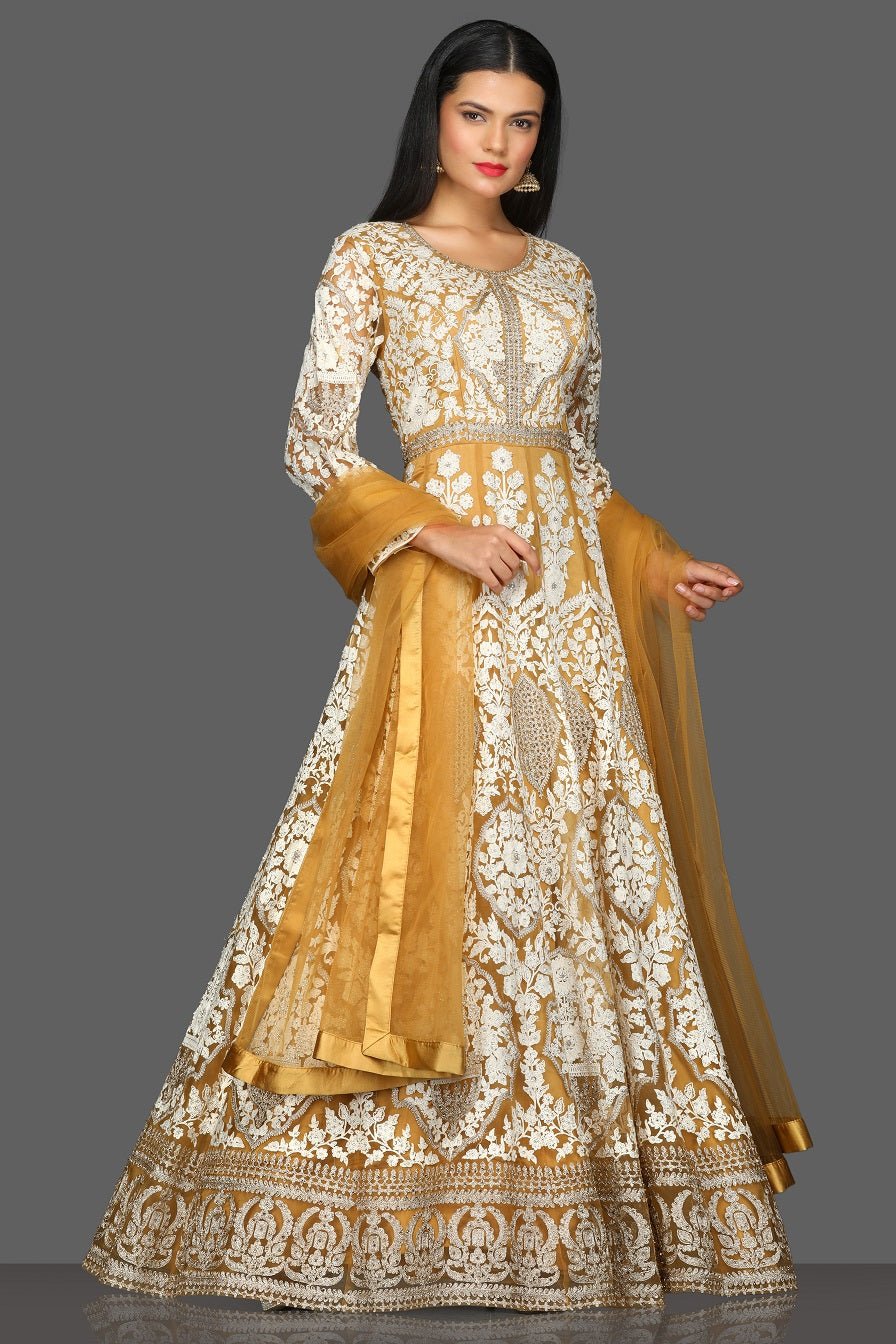 Shop beautiful embroidered floorlength Anarkali online in USA with dupatta. Dazzle on weddings and special occasions with exquisite Indian designer lehengas, sharara suits, Anarkali suits from Pure Elegance Indian fashion store in USA.-side