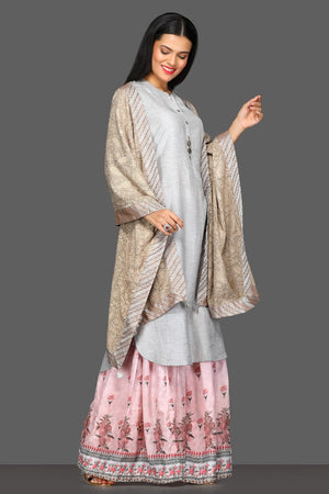 Shop lovely light grey and pink sharara suit online in USA with beige dupatta. Dazzle on weddings and special occasions with exquisite Indian designer lehengas, sharara suits, Anarkali suits from Pure Elegance Indian fashion store in USA.-side