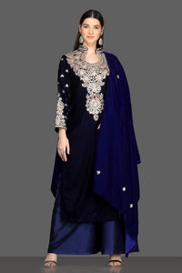 Shop royal blue embroidered velvet palazzo suit online in USA with dupatta. Dazzle on weddings and special occasions with exquisite Indian designer lehengas, sharara suits, Anarkali suits, Indowestern dresses from Pure Elegance Indian fashion store in USA.-full view
