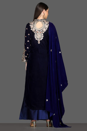 Shop royal blue embroidered velvet palazzo suit online in USA with dupatta. Dazzle on weddings and special occasions with exquisite Indian designer lehengas, sharara suits, Anarkali suits, Indowestern dresses from Pure Elegance Indian fashion store in USA.-back