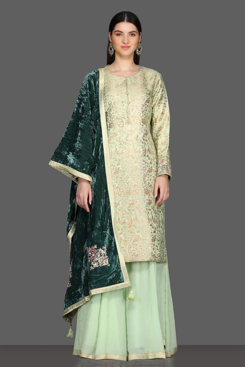Shop beautiful mint green palazzo suit online in USA with green velvet dupatta. Dazzle on weddings and special occasions with exquisite Indian designer dresses, sharara suits, Anarkali suits from Pure Elegance Indian fashion store in USA.-full view