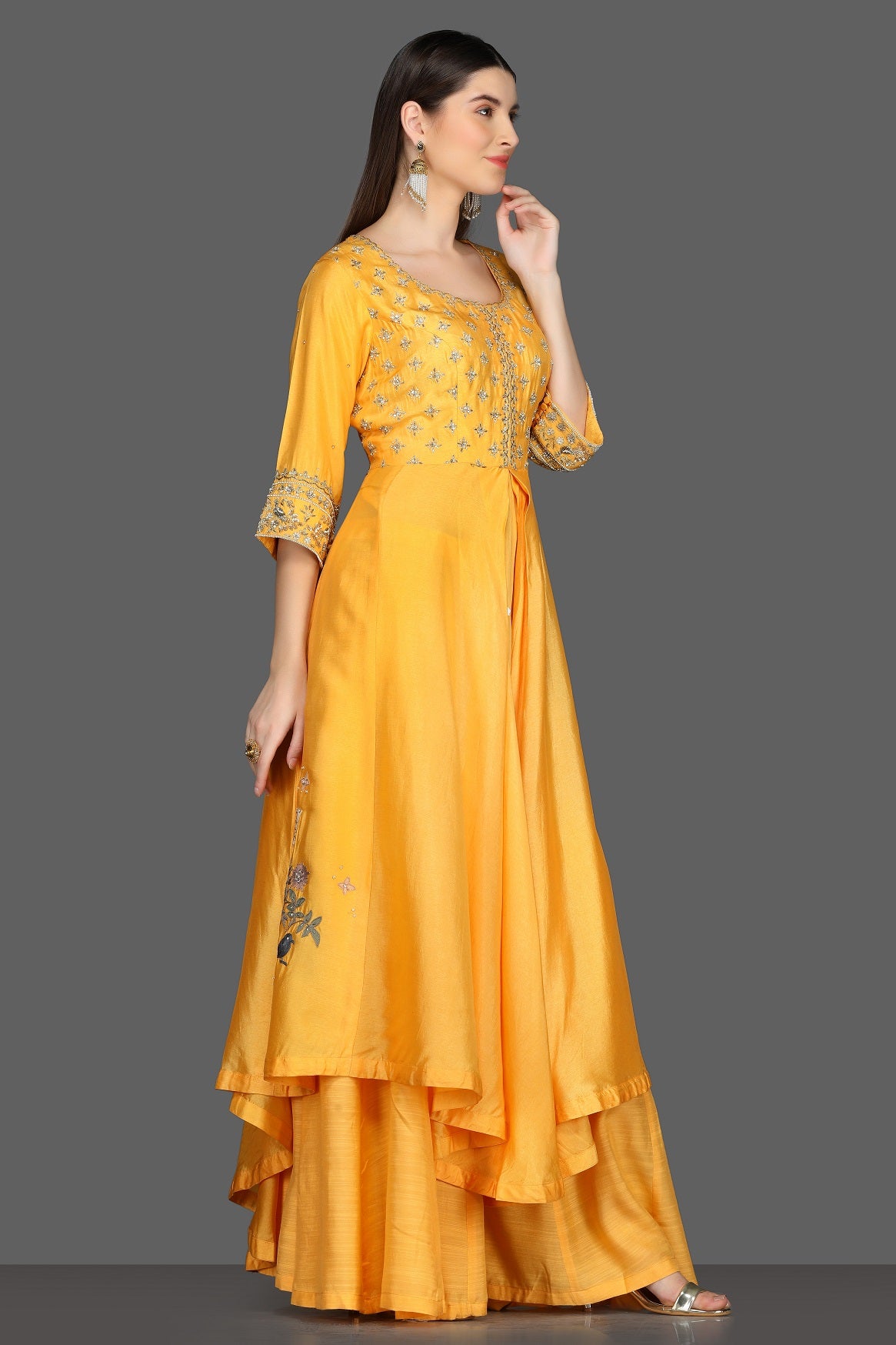 Buy yellow embroidered asymmetric palazzo suit online in USA. Dazzle on weddings and special occasions with exquisite Indian designer dresses, sharara suits, Anarkali suits from Pure Elegance Indian fashion store in USA.-right