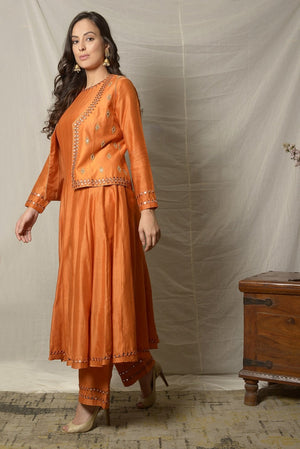 Shop gorgeous burnt orange embroidered chanderi suit with jacket online in USA and dupatta. Shine at weddings and special occasions with beautiful Indian designer suits, gowns, lehengas from Pure Elegance Indian clothing store in USA.-left side