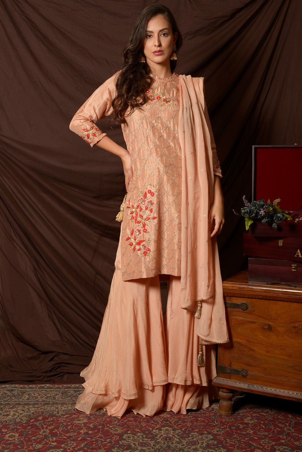 Shop beautiful peach embroidered Uppada silk suit online in USA with dupatta. Shine at weddings and special occasions with beautiful Indian designer suits, gowns, lehengas from Pure Elegance Indian clothing store in USA.-full view