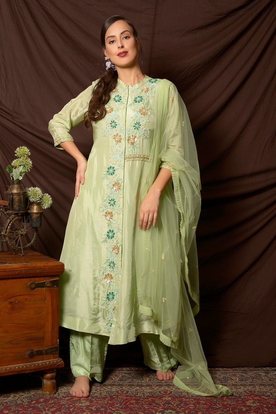 Shop beautiful dusty green embroidered Uppada silk palazzo suit online in USA with dupatta. Shine at weddings and special occasions with beautiful Indian designer suits, gowns, lehengas from Pure Elegance Indian clothing store in USA.-full view
