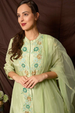 Shop beautiful dusty green embroidered Uppada silk palazzo suit online in USA with dupatta. Shine at weddings and special occasions with beautiful Indian designer suits, gowns, lehengas from Pure Elegance Indian clothing store in USA.-top