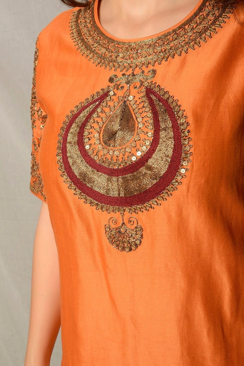 Buy stunning burnt orange embroidered chanderi sharara suit online in USA with dupatta. Shine at weddings and special occasions with beautiful Indian designer suits, gowns, lehengas from Pure Elegance Indian clothing store in USA.-closeup