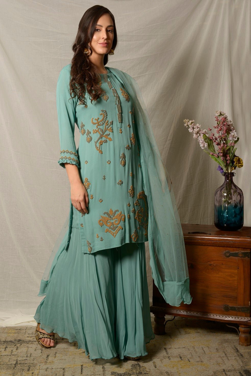 Shop elegant dark aqua embroidered georgette sharara suit online in USA with dupatta. Shine at weddings and special occasions with beautiful Indian designer suits, gowns, lehengas from Pure Elegance Indian clothing store in USA.-right