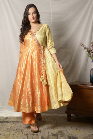 Buy elegant yellow and orange embroidered Angrakha suit online in USA with dupatta. Shine at weddings and special occasions with beautiful Indian designer suits, gowns, lehengas from Pure Elegance Indian clothing store in USA.-front