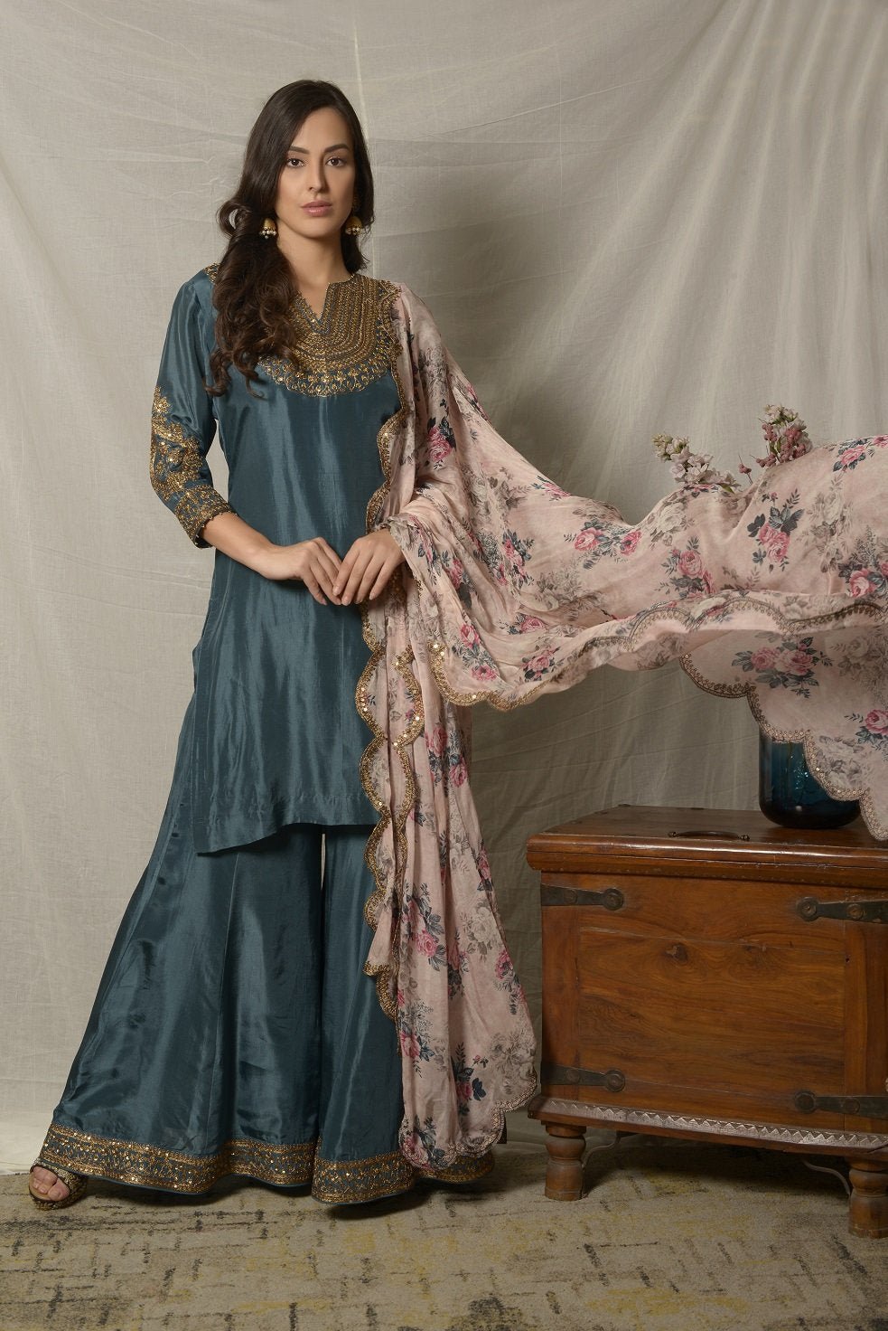 Buy beautiful teal blue embroidered Uppada silk suit online in USA with pink floral dupatta. Shine at weddings and special occasions with beautiful Indian designer suits, gowns, lehengas from Pure Elegance Indian clothing store in USA.-full view