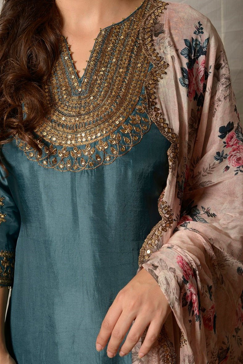 Buy beautiful teal blue embroidered Uppada silk suit online in USA with pink floral dupatta. Shine at weddings and special occasions with beautiful Indian designer suits, gowns, lehengas from Pure Elegance Indian clothing store in USA.-closeup