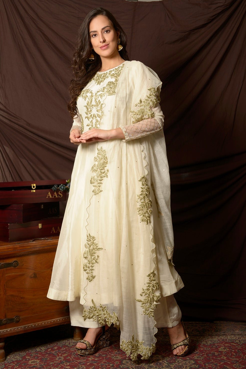 Buy gorgeous off-white embroidered Uppada silk suit online in USA with matching dupatta. Shine at weddings and special occasions with beautiful Indian designer suits, gowns, lehengas from Pure Elegance Indian clothing store in USA.-side